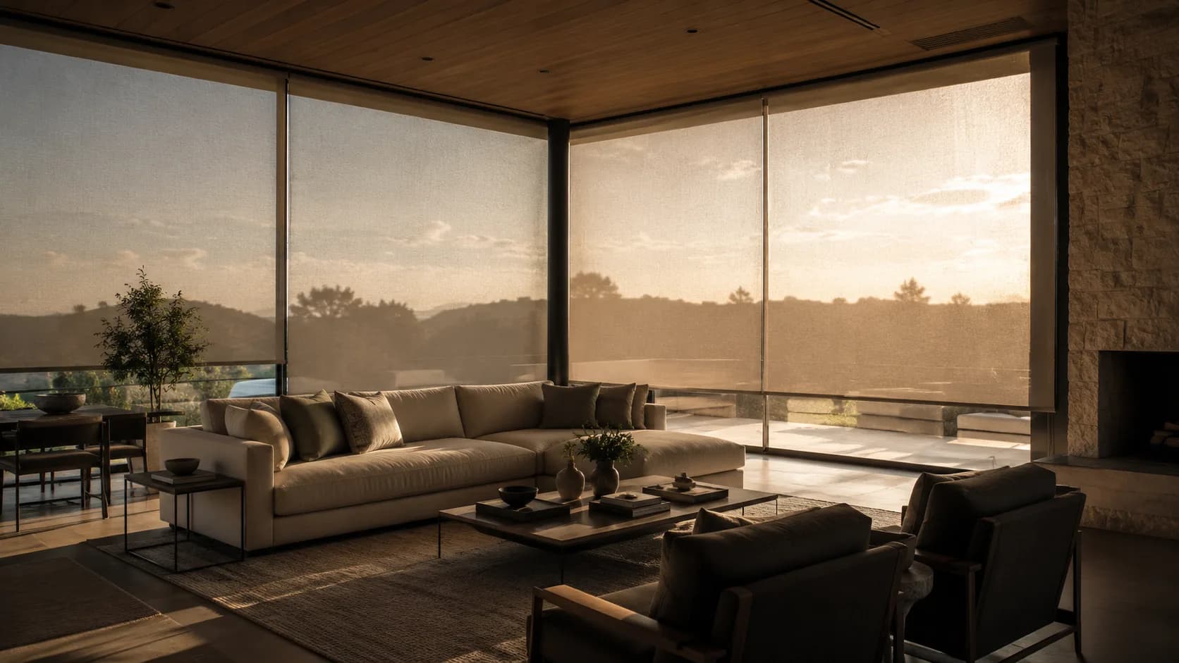 Living room wrapped in sheer automated shades diffusing golden-hour sun