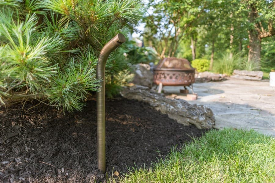 Coastal Source path lights along a curved garden walk